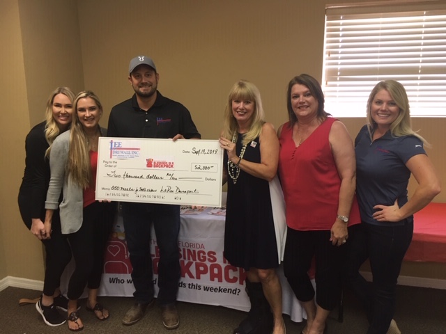 Blessings in a Backpack SWFL and Lee Drywall work to fight childhood hunger
