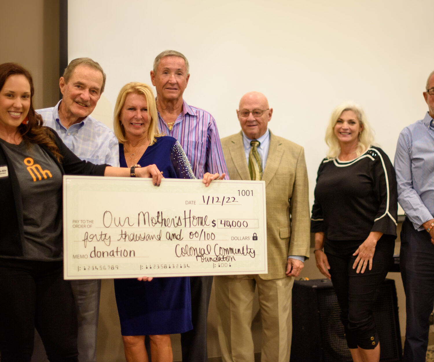 Alicia Miller with members of the Colonial Charitable Foundation