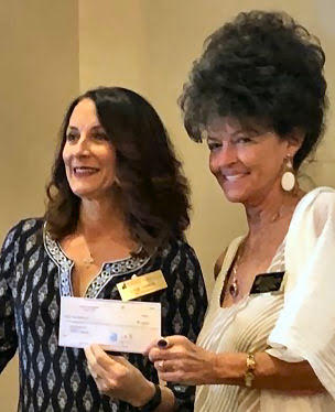 Scott Fischer Charities presents $30,000 to the Paul Sands Memorial REIS Scholarship fund at FGCU